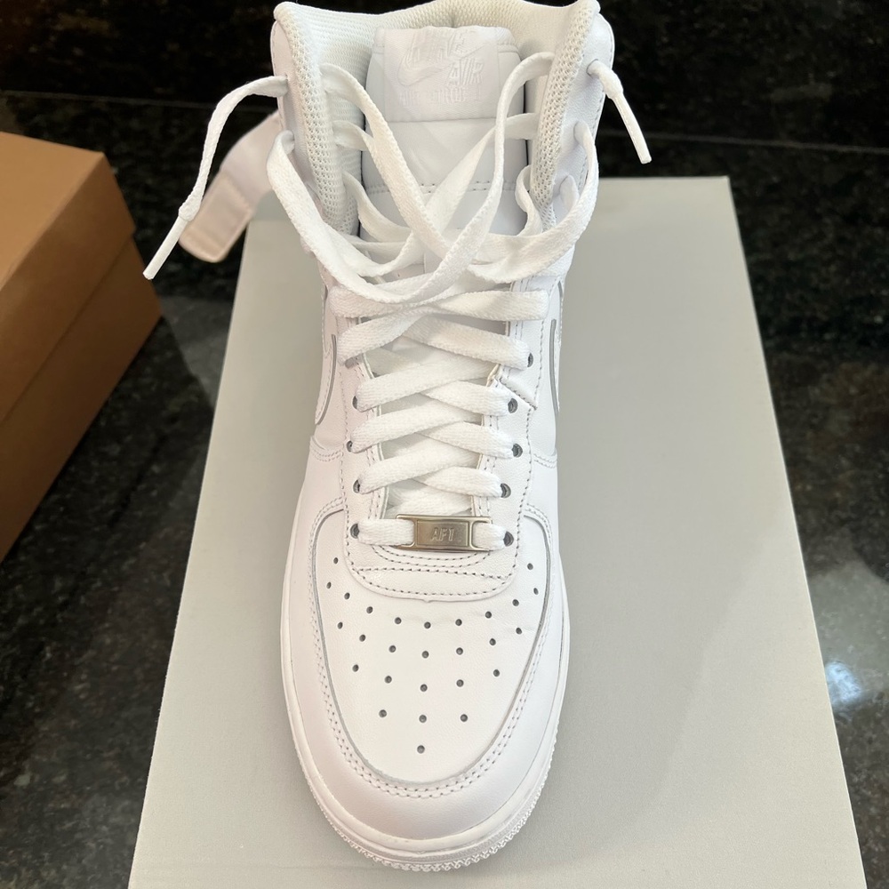 Women’s Nike Air Force 1 high top. Brand new !